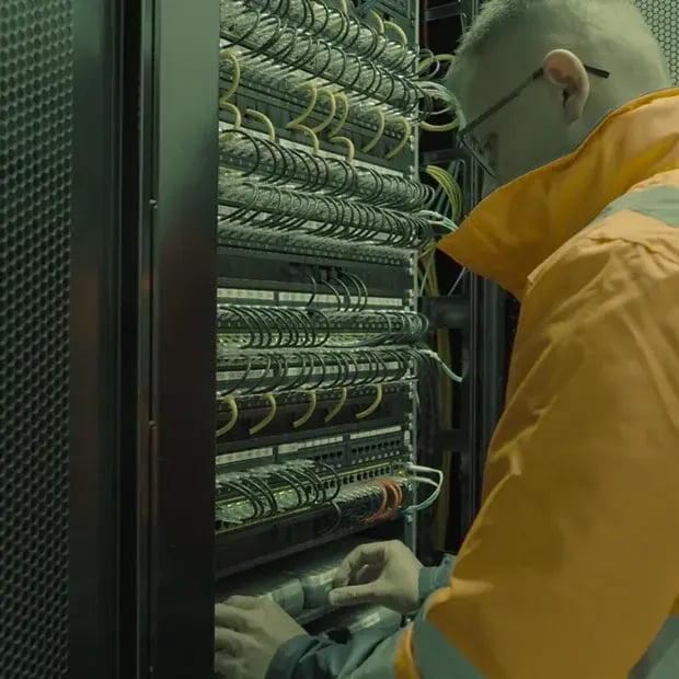 man-working-on-servers