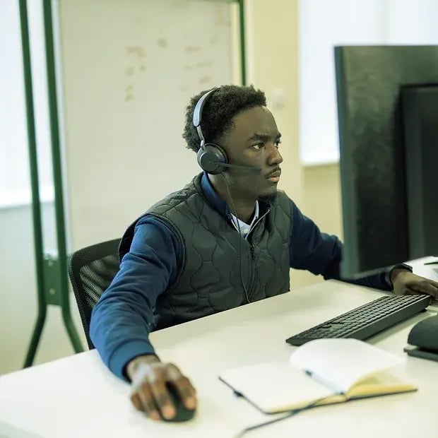 man-wearing-headset-working