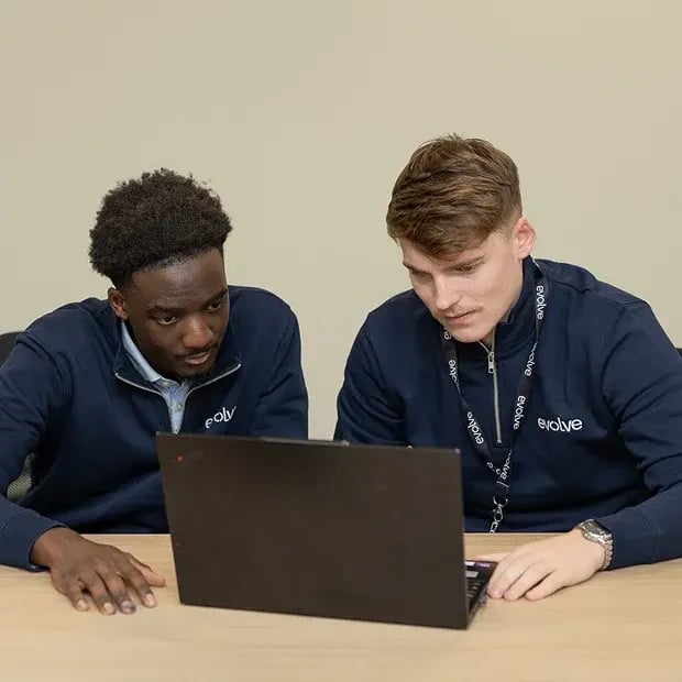 two-men-looking-at-laptop